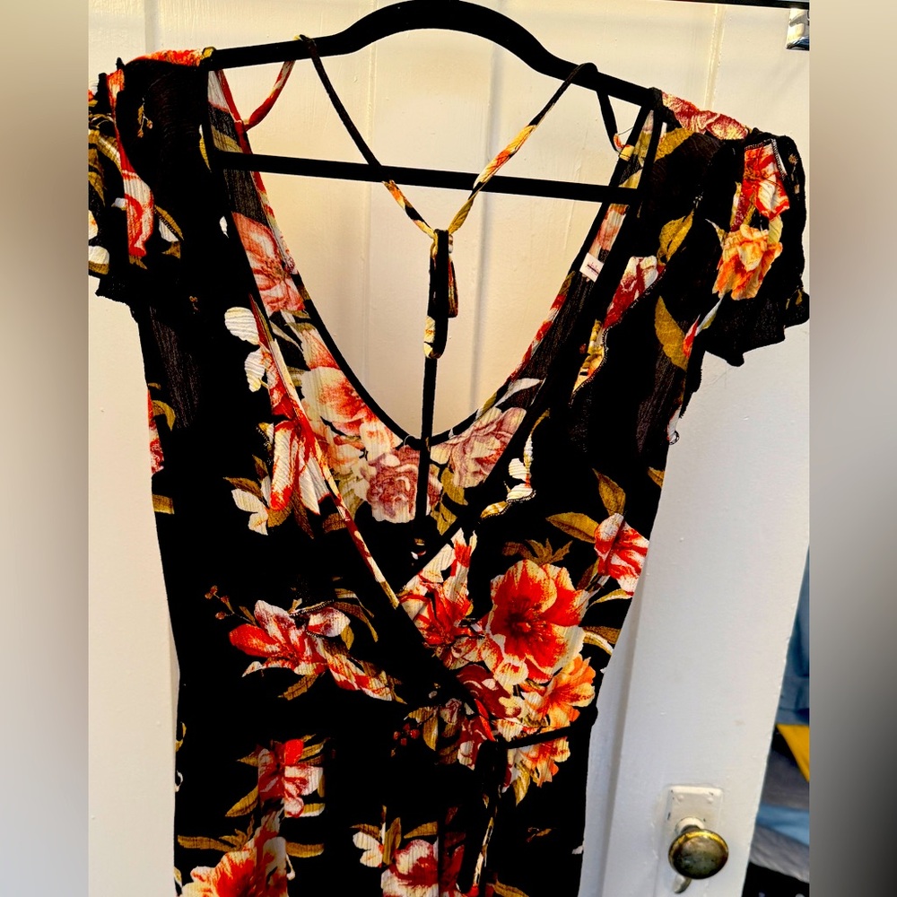 Chic Black Dress with Vibrant Floral Design